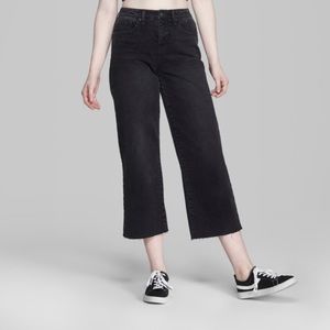 Cropped black jeans with frayed hem